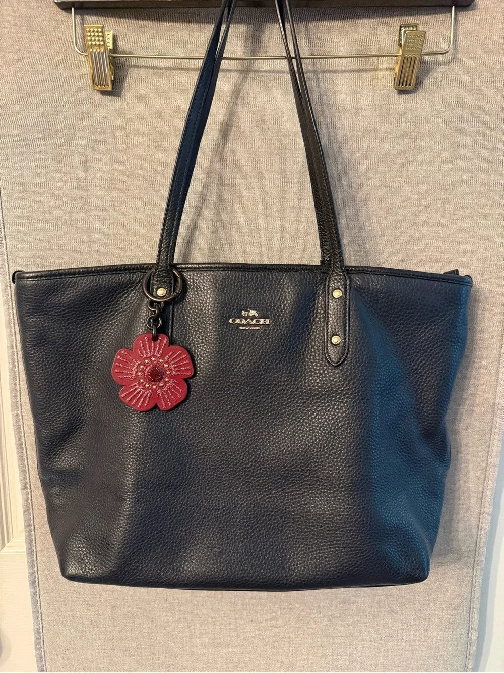 Coach Black Pebbled Leather Tote with Red Flower Charm